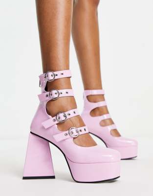 True Romance multi buckle platform shoes in pink patent