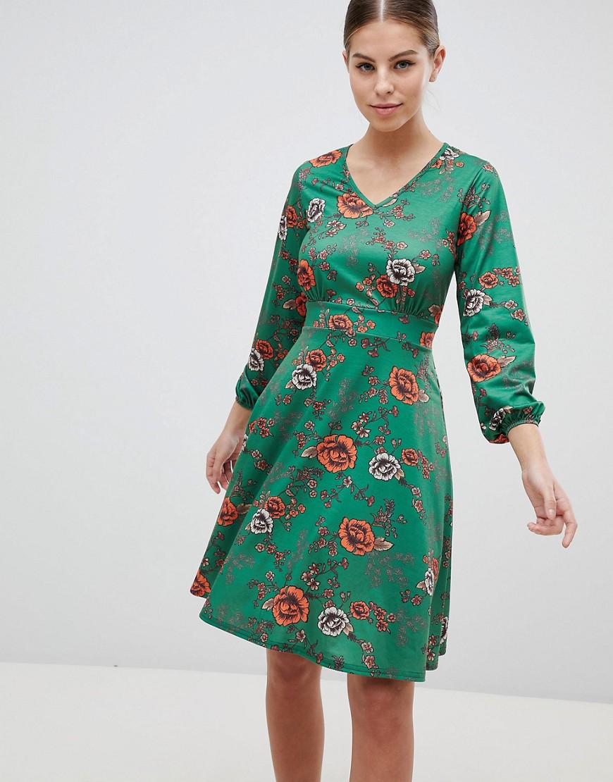 Langærmet tea-kjole med v-udskæring og bindebånd bagpå fra Club L-Multifarvet