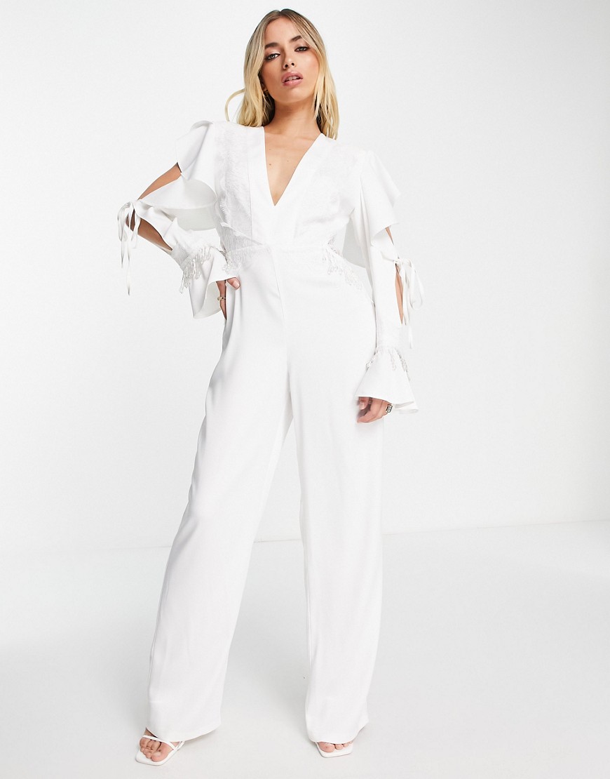Lashes Of London plunge neck jumpsuit with tie sleeve detail in white