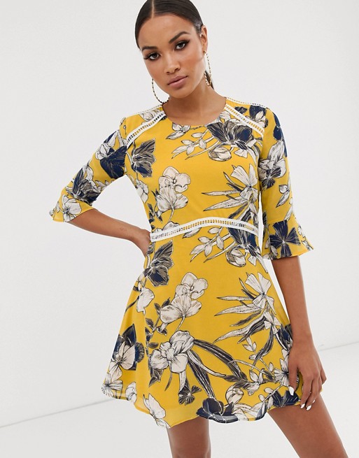 Lasula mini tea dress with fluted sleeve in yellow floral print