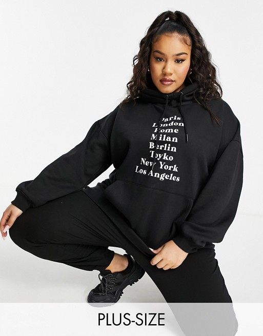 Lasula Plus oversized hoodie with city print in black