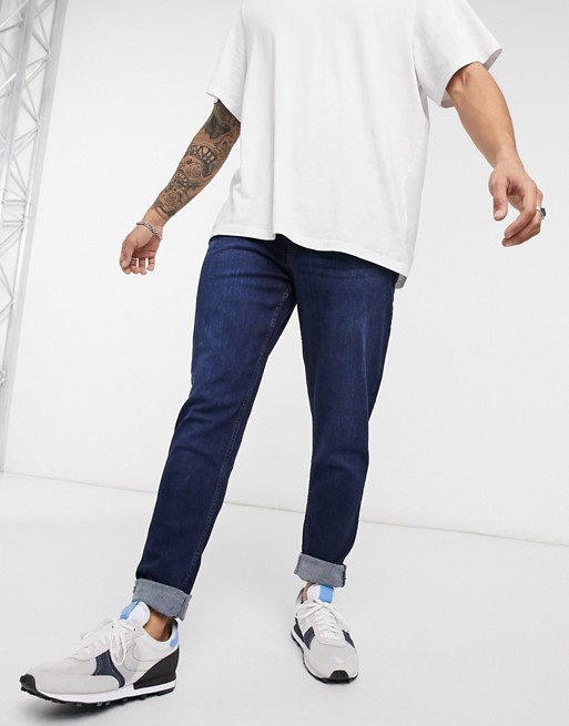 LDN DNM carrot fit jeans in dark washed indigo