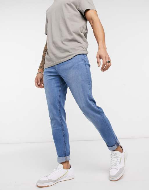 LDN DNM carrot fit jeans in stone washed blue