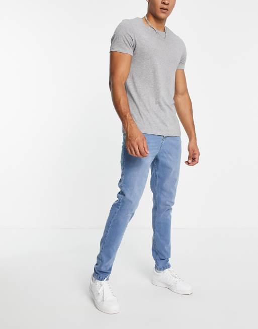 LDN DNM carrot fit jeans in stone washed blue