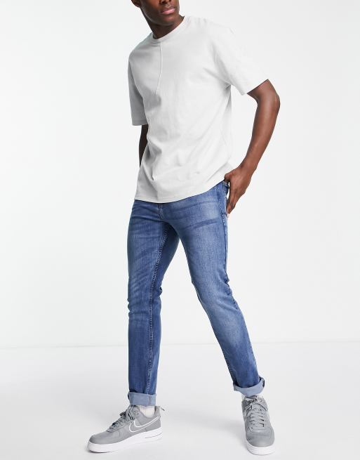 LDN DNM – Schmal geschnittene Jeans in verwaschenem Mittelblau