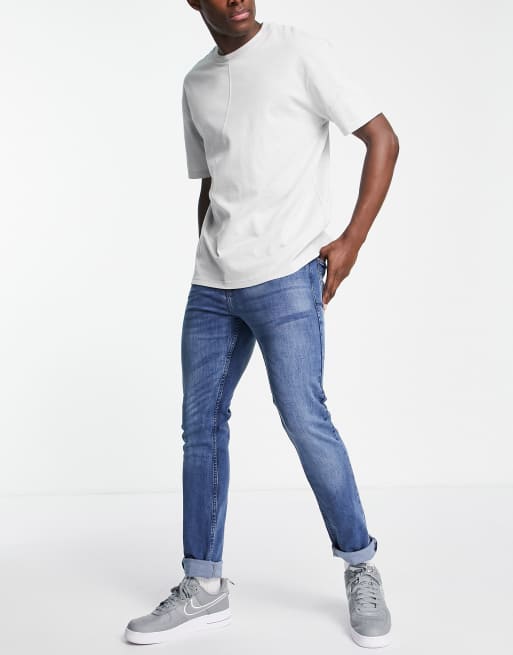 LDN DNM – Schmal geschnittene Jeans in verwaschenem Mittelblau