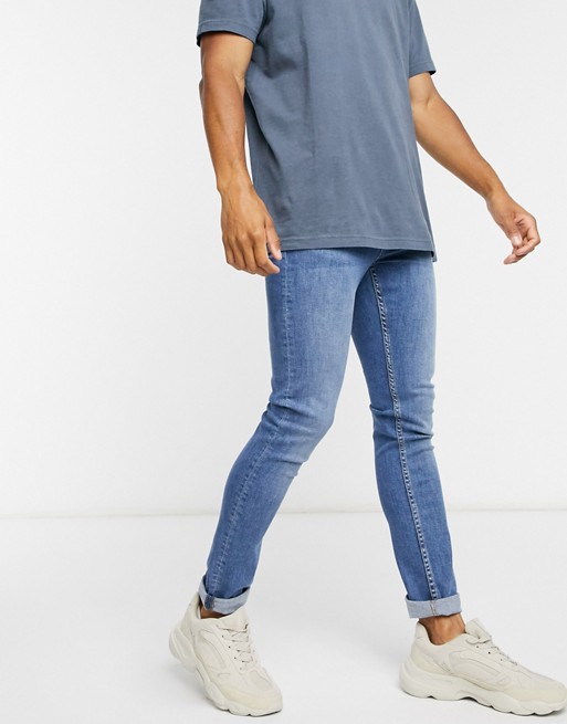 LDN DNM skinny fit jeans in mid blue wash
