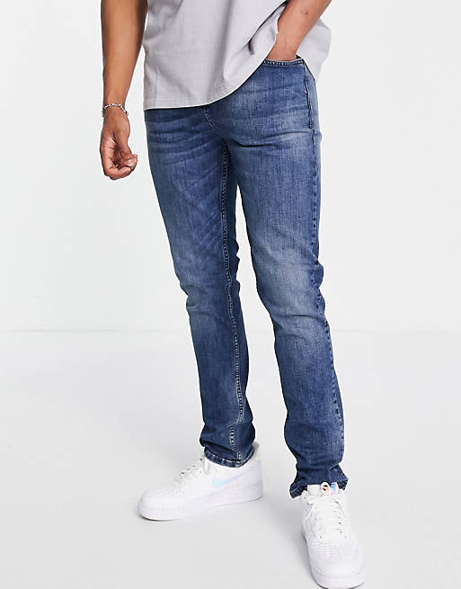 LDN DNM slim fit jeans in mid blue wash
