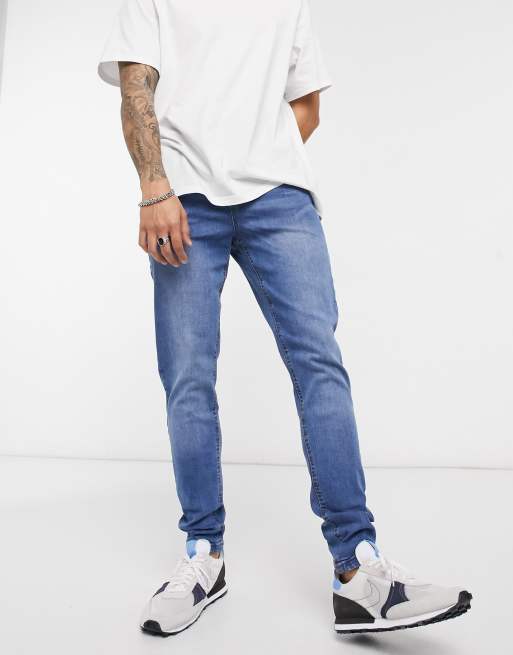 LDN DNM - Smaltoelopende jeans in middenblauwe wassing
