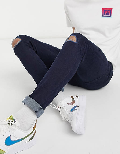 Le Breve – Blå skinny jeans med slitna knän