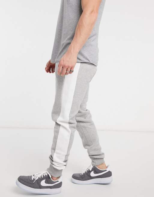 Grey joggers store white stripe