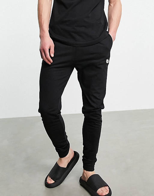 Le Breve lounge co-ord cuffed pants in black with red band