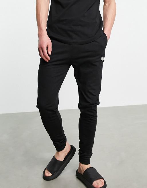 Le Breve lounge cuffed joggers co-ord in black with red band | ASOS