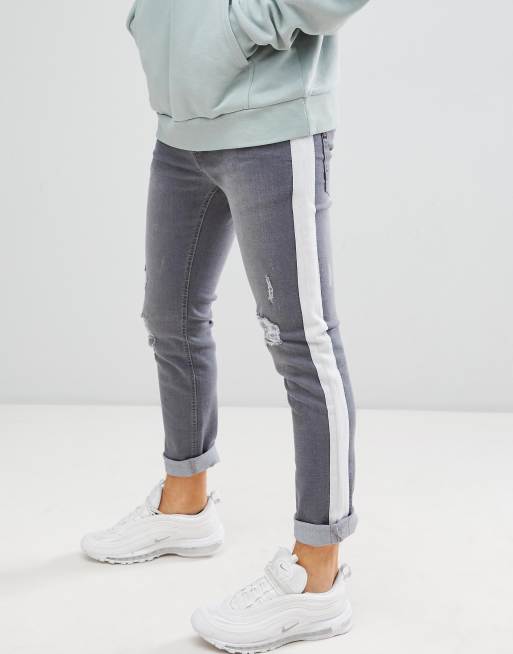 Striped best sale distressed jeans