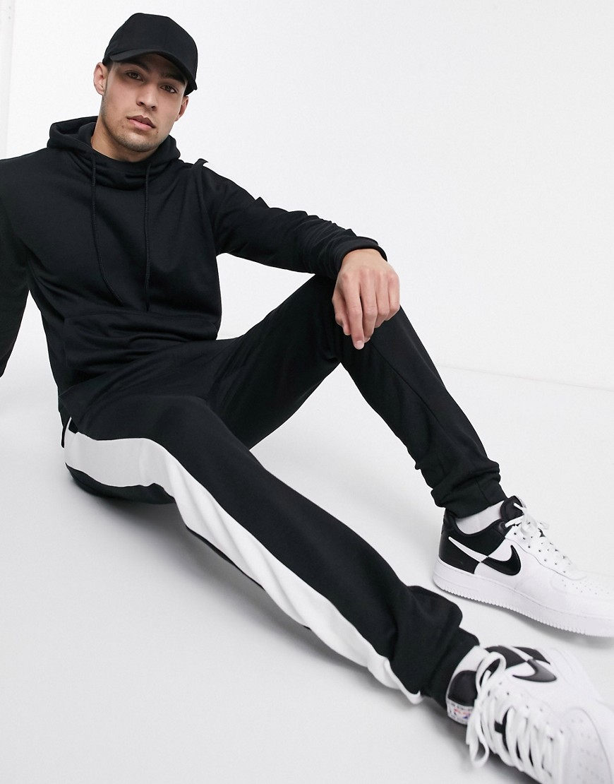 Le Breve two-piece slim fit jogger in black with white panel