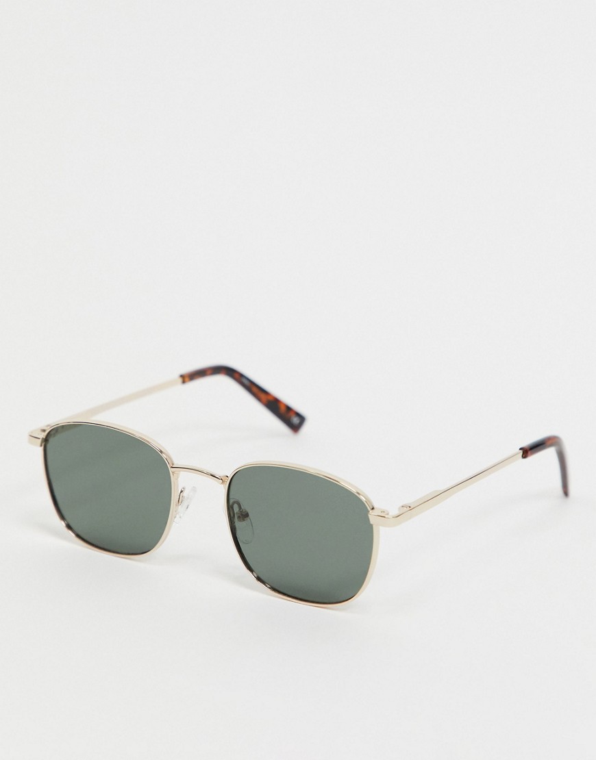 Le Specs – Guldfärgade runda solglasögon