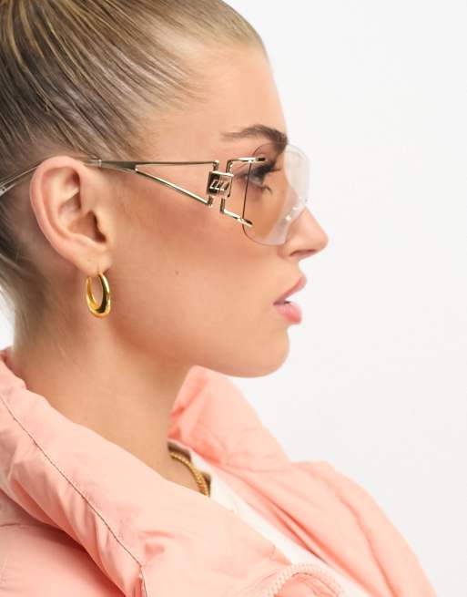 Le Specs le fame sunglasses in gold | ASOS display picture 1