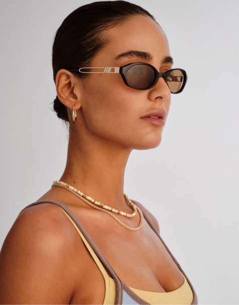 Le Specs lunita oval sunglasses in black with brown lens 