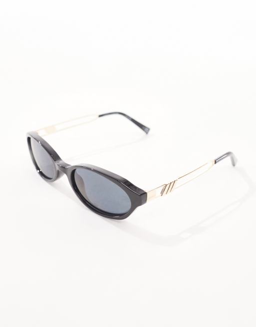Le Specs lunita oval sunglasses in black | ASOS display picture 1