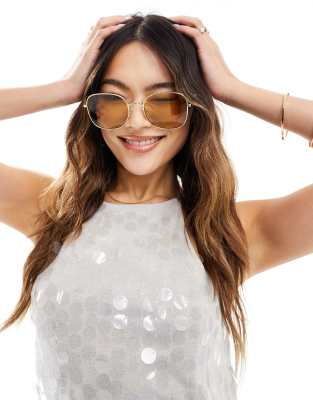 Le Specs metamorphosis oversized round sunglasses in gold