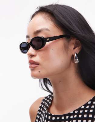 Le Specs Outta Love Oval Sunglasses In Black