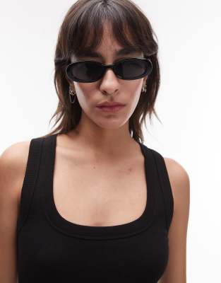 outta love oval sunglasses in black