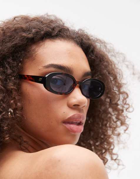 Le Specs outta love oval sunglasses in tortoiseshell with blue tint lens - view 1