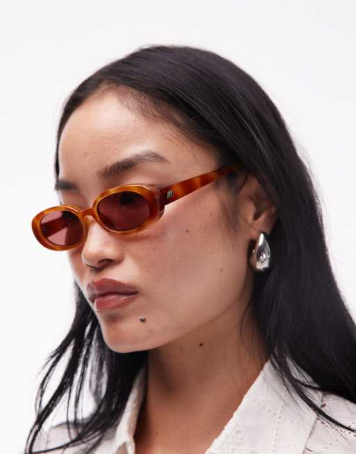 Le Specs Outta Love oval sunglasses in vintage tort with rose lens, 2 of 3