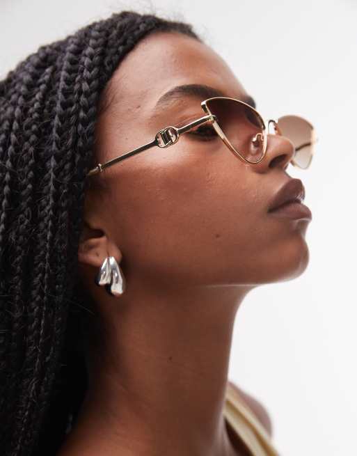 Le Specs – The Soiree – Guldfärgade, smala solglasögon i cateye-modell av metall, 3 av 3