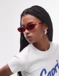 [Le Specs] Le Specs The Whisperer oval sunglasses in garnet red No Size RED