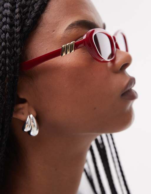 Le Specs the whisperer oval sunglasses in garnet red | ASOS display picture 1