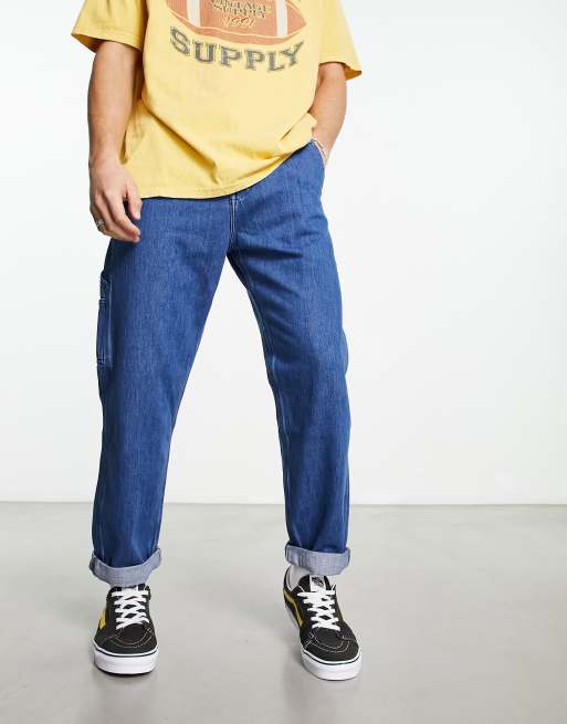 Lee Carpenter tapered fit jeans in light blue | ASOS