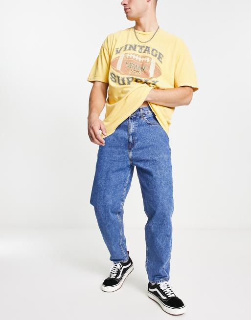 Lee - Easton - Løse tapered jeans i mellemvask