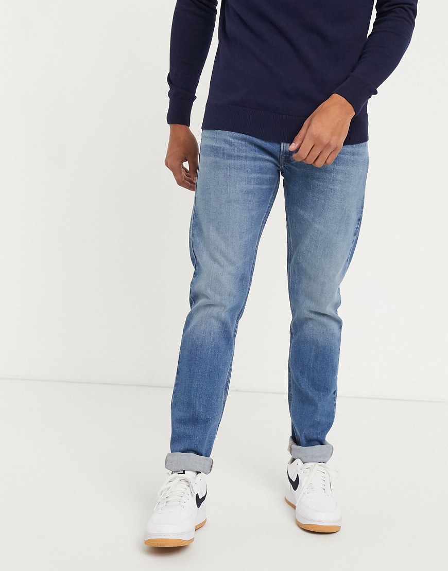 Lee Jeans – Luke – Ljusblå avsmalnande slim jeans-Marinblå