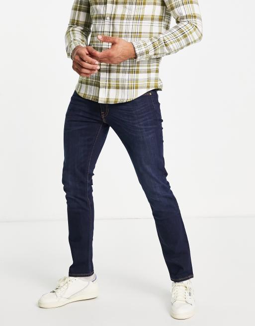 Lee – Luke – Mellanblå, avsmalnande jeans