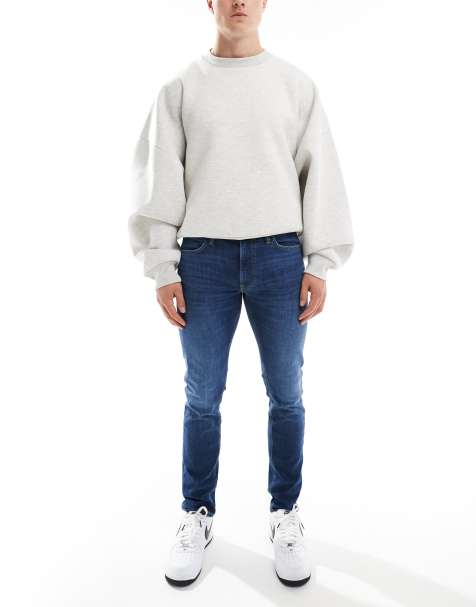 Lee – Luke – Schmal zulaufende Jeans in dunkler Waschung mit schmalem Schnitt - view 1