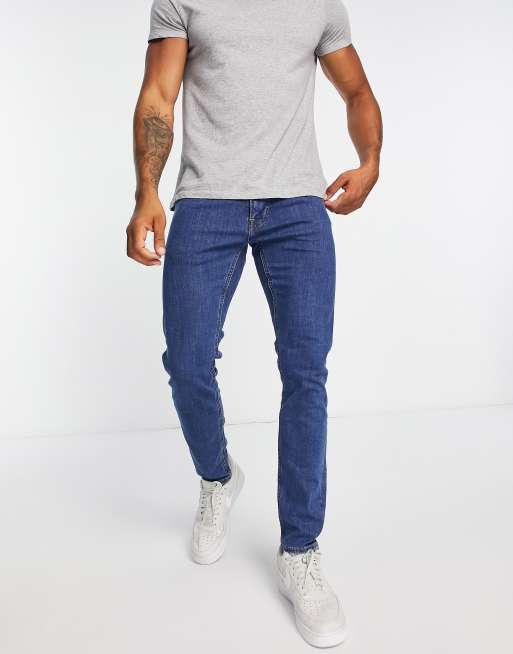 Lee luke slim tapered fit jeans in mid stonewash