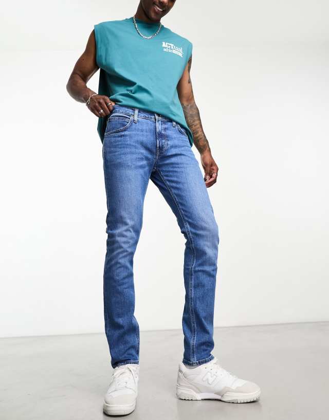 Lee - luke slim tapered fit jeans in mid wash