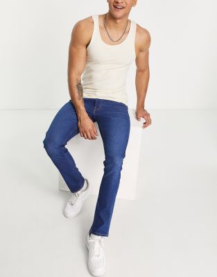 Lee Lee Luke slim tapered jean in mid blue