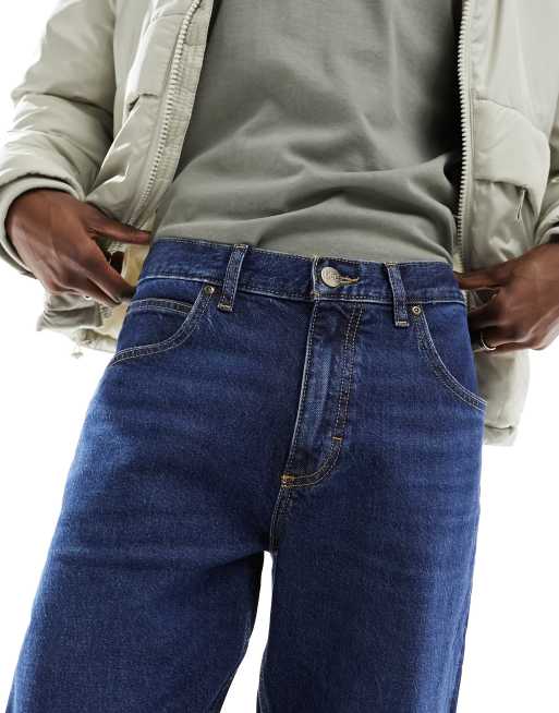 Lee – Oscar – Lässig geschnittene und schmal zulaufende Jeans in dunkelblauer Nostalgia-Waschung, 5 von 5