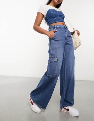 Lee - Stella - Weite Cargo-Jeans in Mittelblau