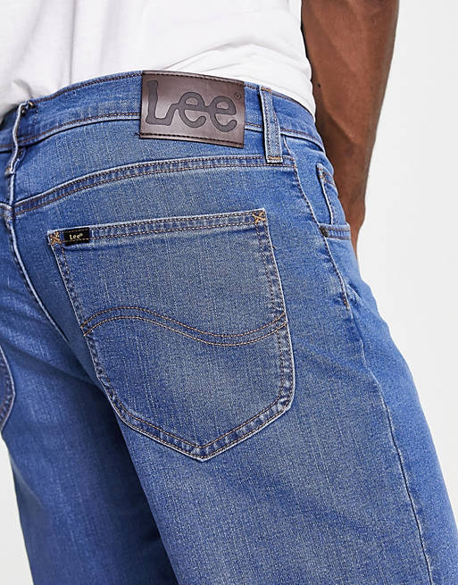 Lee West relaxed fit jeans in mid blue | ASOS