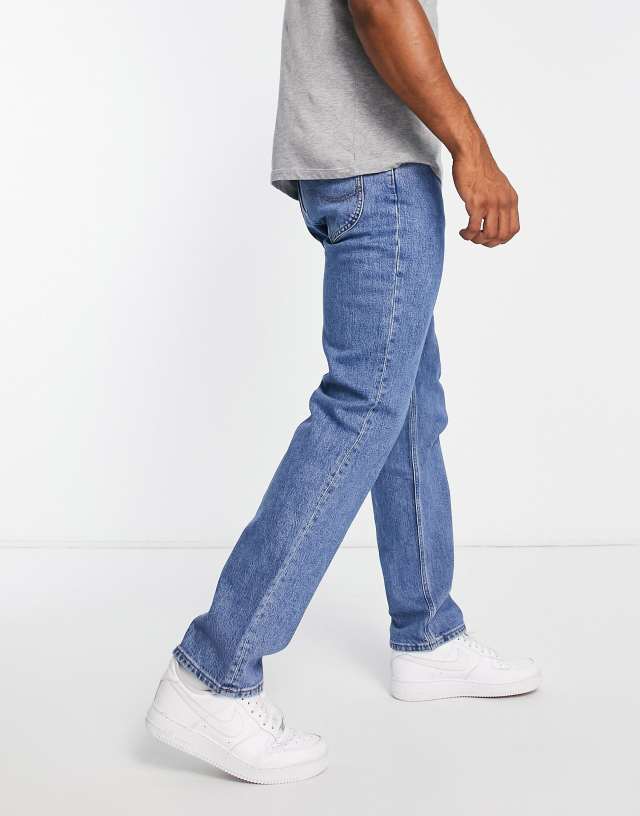 Lee west relaxed tapered fit jeans in light wash