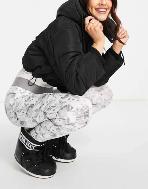 Leggings blancos térmicos de esquí con estampado floral punteado Cozy CarbonDri de Surfanic