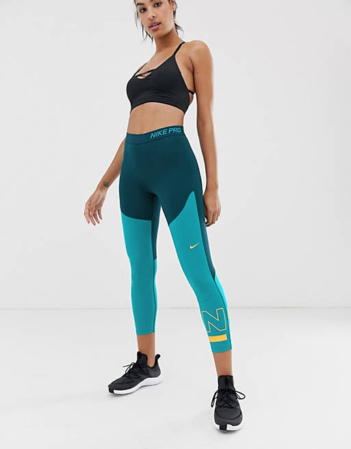 etc. Realizable Por adelantado Leggings con diseño colour block en verde azulado y azul marino de Nike  Training | ASOS