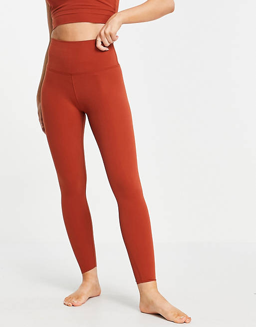 Mujer Leggings | Leggings de 7/8 para yoga naranja óxido Luxe de Nike - HX75658