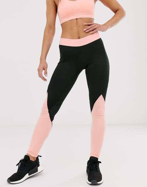 Leggings deportivos con diseño colour block en negro y rosa de adidas