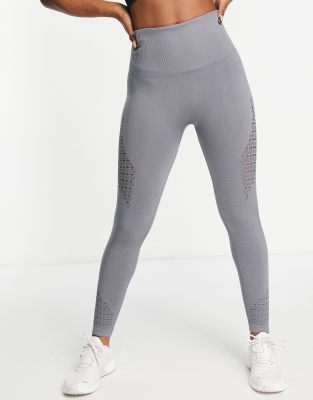 Leggings deportivos gris oscuro de talle alto con detalle calado sin costuras de I Saw It First | ASOS