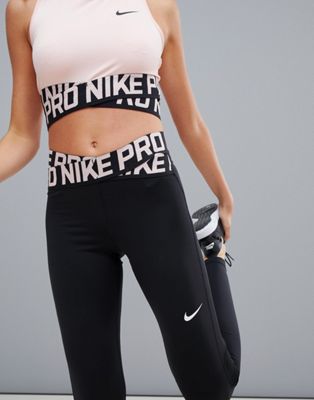 Leggings en negro y rosa Pro Training Crossover de Nike ASOS