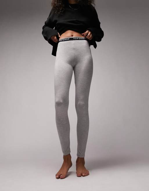 Leggings grises con cinturilla con detalle de la marca de Topshop